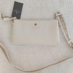 kate spade Cream Pebbled Leather Crossbody with Logo Strap